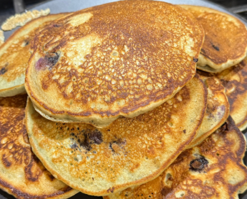A stack of pancakes on a plate | Why Overthinking Ruins Your Performance (The Lesson of the Pancake)