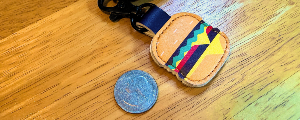 Quarter laying next to an Aldi quarter holder on a keychain | What the Aldi Quarter Teaches About Getting Unstuck